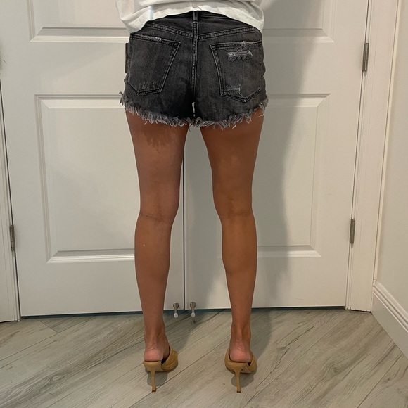 Never worn Free People denim shorts. - Picture 2 of 4